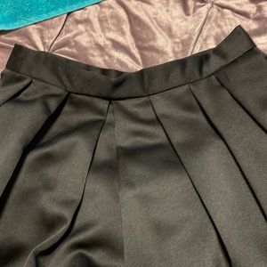 Brand new black box pleat silk taffeta skirt with petticoat lining.